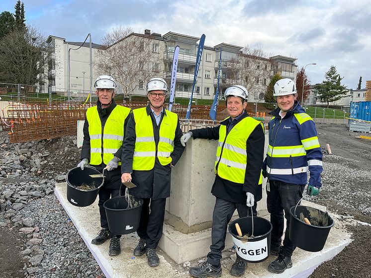 Människor, betong, byggarbetsplats